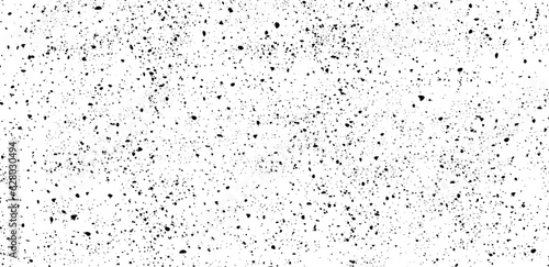 Hand drawn scattered black grunge dots or dust, grungy dirty texture for banner, poster, retro and vintage design. Black and white grunge, surface dust and rough dirty background. Grainy texture vecto
