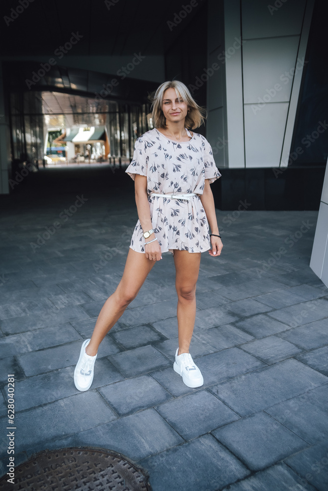 Fototapeta premium woman walking on a street