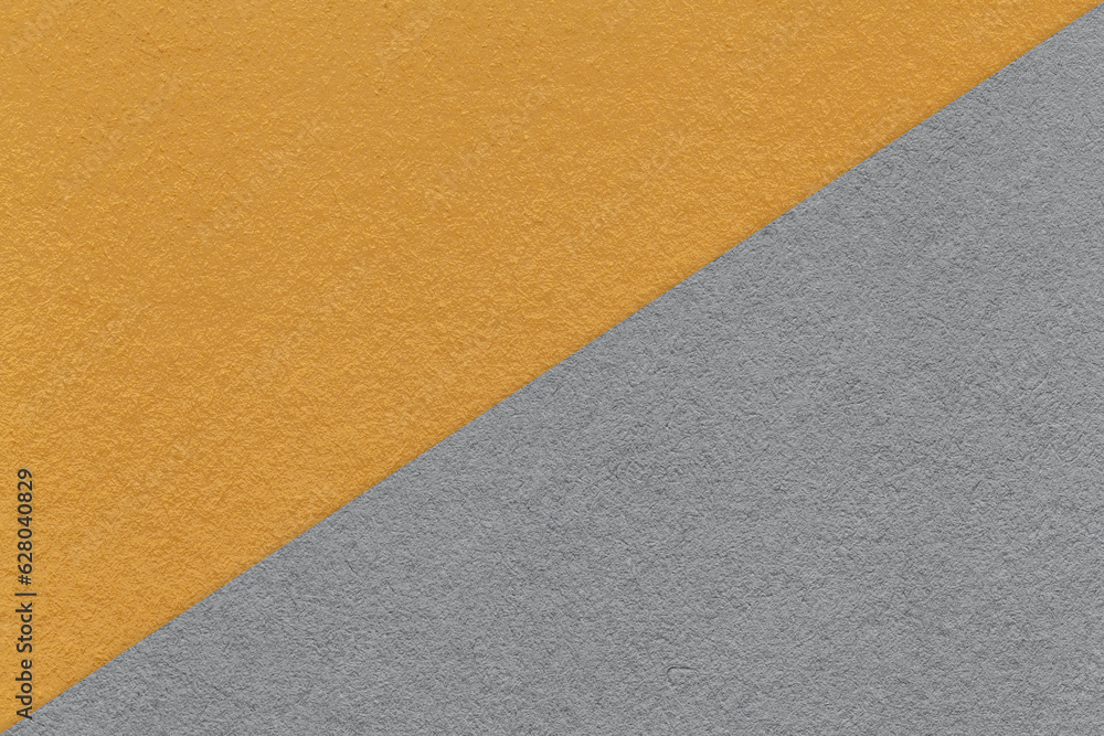 Texture of craft dark orange and gray paper background, half two colors, macro. Vintage kraft grey cardboard. Texture of craft dark orange and gray paper background, half two colors, macro. Vintage kraft grey cardboard.