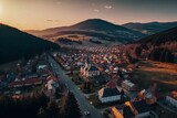 Drone captures Krynica Zdroj city and Beskid Sadecki mountains in aerial view. Generative AI
