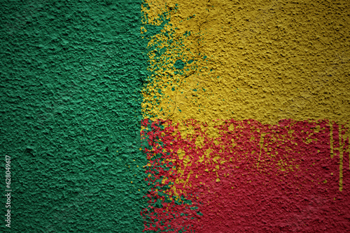 painted big national flag of benin on a massive old cracked wall