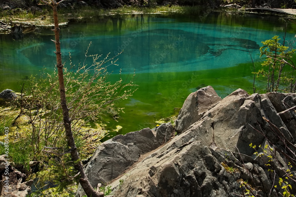 Geyser lake near Aktash village in Altai. Geyser lake near Aktash village in Altai.