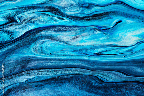 Blue flowing paint texture. Marbled paper abstract background © Nik_Merkulov