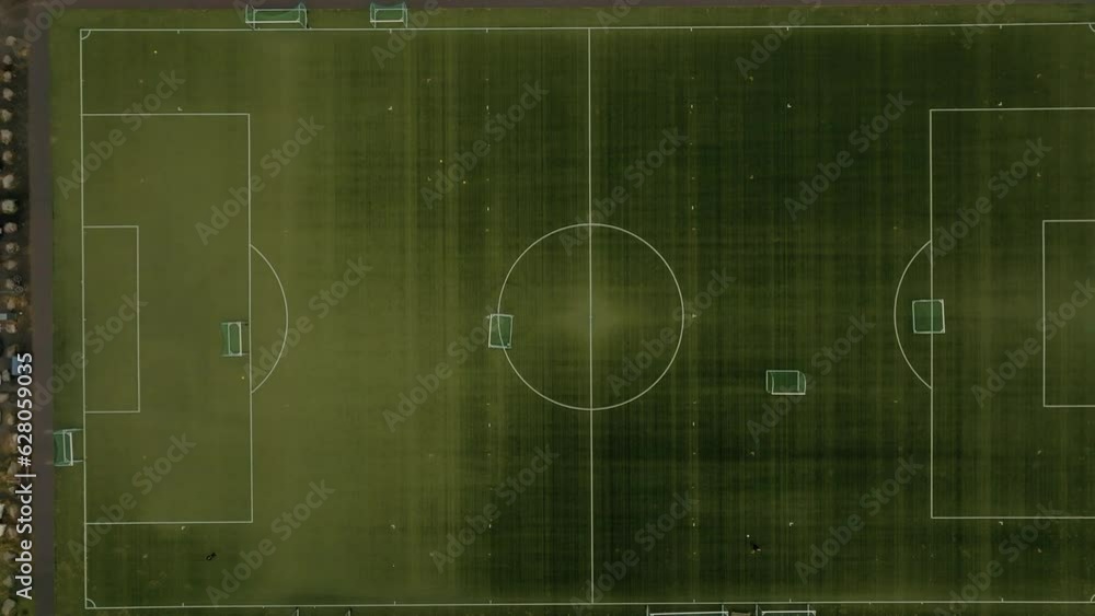 Drone zooms out of famous football court in Henningsvaer village. Drone zooms out of famous football court in Henningsvaer village.