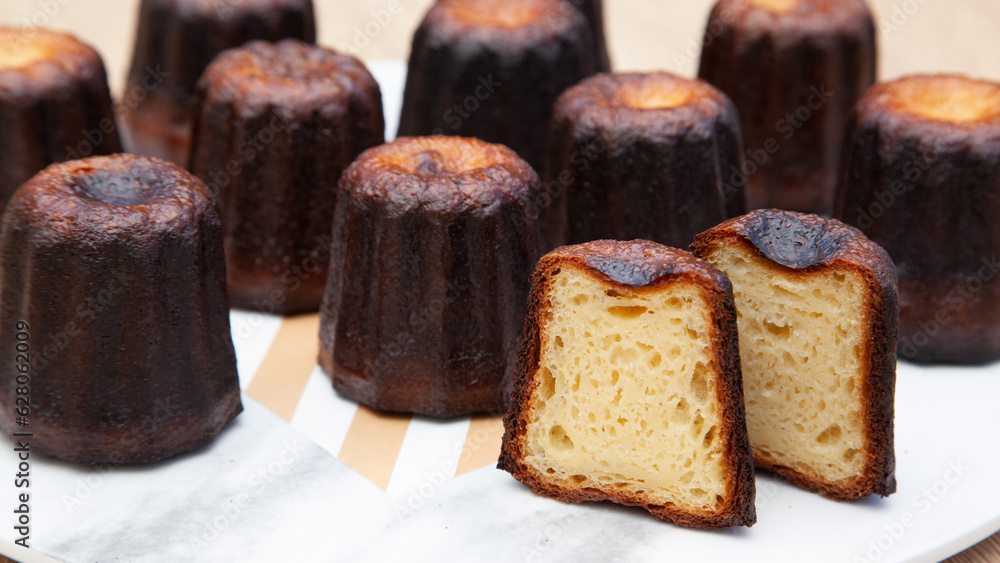 Canele, a small french pastry flavored with rum and vanilla Canele, a small french pastry flavored with rum and vanilla