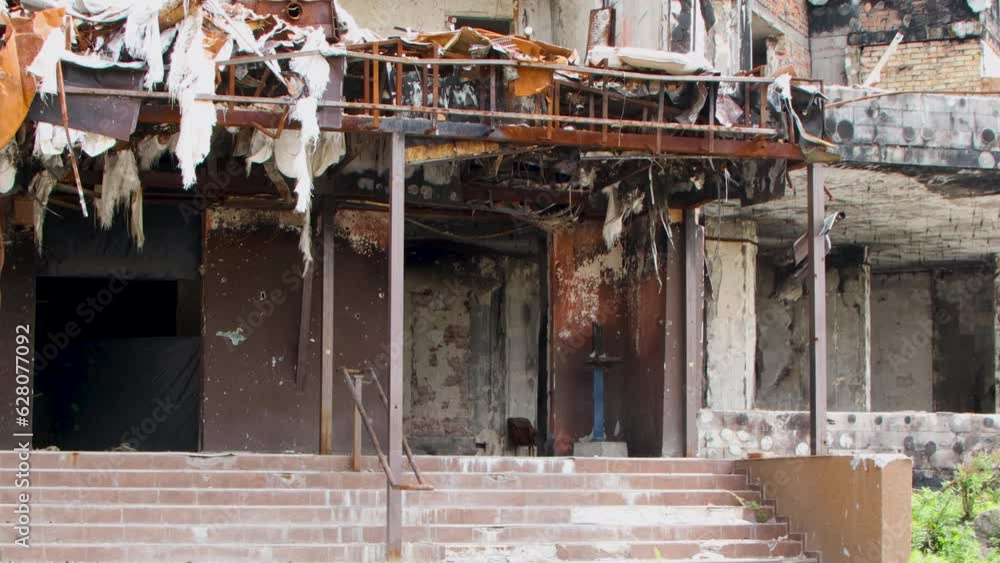 Damage to a house a year after the missile attack, Irpin, Ukraine Damage to a house a year after the missile attack, Irpin, Ukraine