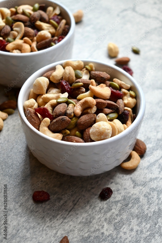 Trail mix in a white bowl Trail mix in a white bowl