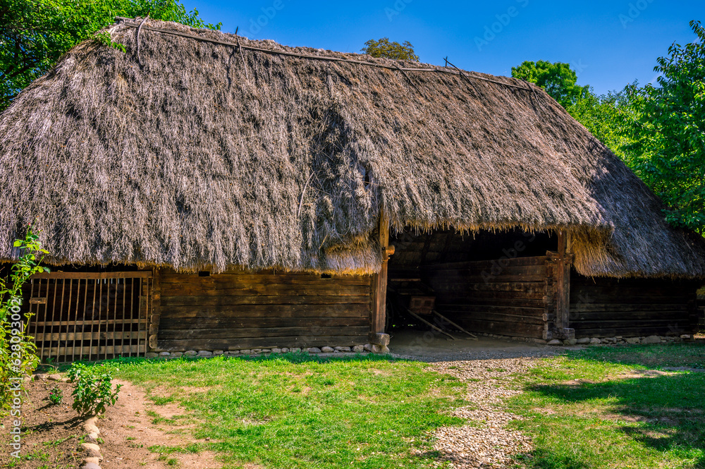 BUCHAREST, ROMANIA - Dimitrie Gusti National Village Museum, located in Herastrau Park showcasing traditional Romanian village life. BUCHAREST, ROMANIA - Dimitrie Gusti National Village Museum, located in Herastrau Park showcasing traditional Romanian village life.