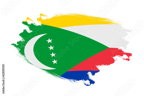 Abstract stroke brush textured national flag of Comoros on isolated white background