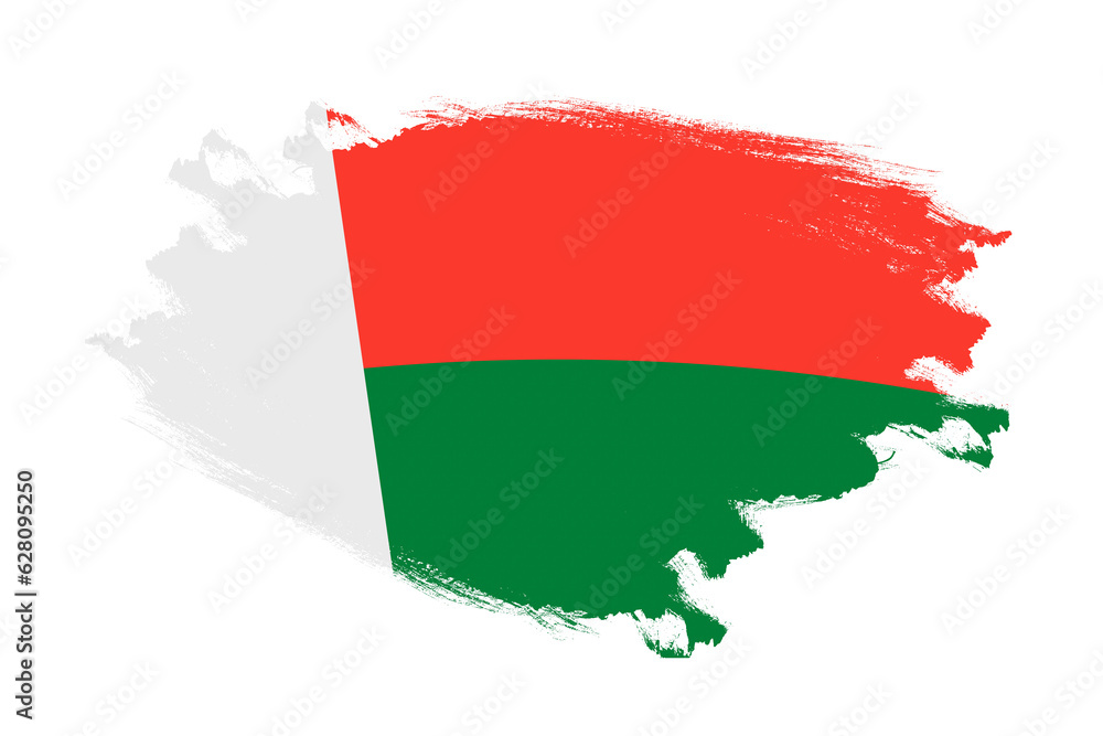Abstract stroke brush textured national flag of Madagascar on isolated white background Abstract stroke brush textured national flag of Madagascar on isolated white background