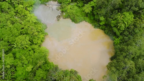 Nature beauty of mud lake Agco on Mount Apo. Boiling lake in the rainforest. Mindanao, Philippines. Travel concept. photo
