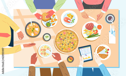 Group of business people having dinner in restaurant Table full of plates with food Human hands holding cutlery top view