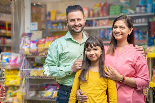 Happy Indian family at grocery shop. © PRASANNAPIX