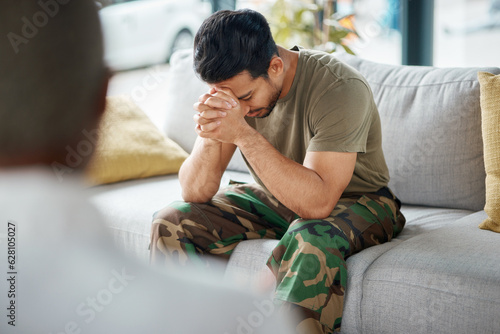 Stress, trauma and male soldier in therapy for mental health, depression or grief after a military war. Frustrated, ptsd and sad man army warrior talking to a psychologist about emotions in a office. © Malik/peopleimages.com
