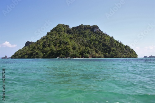 view to small rock islands surrounded by blue water