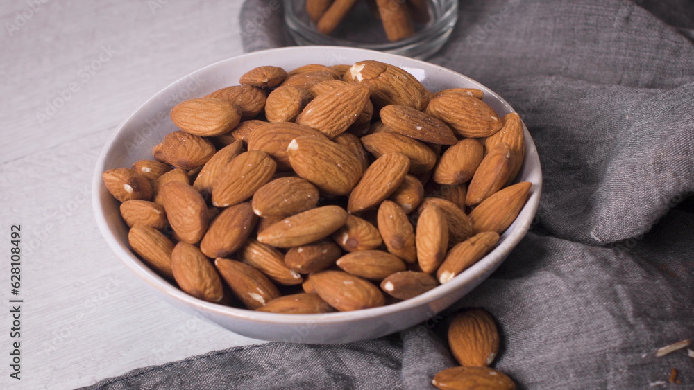Bowl with peeled almonds Bowl with peeled almonds