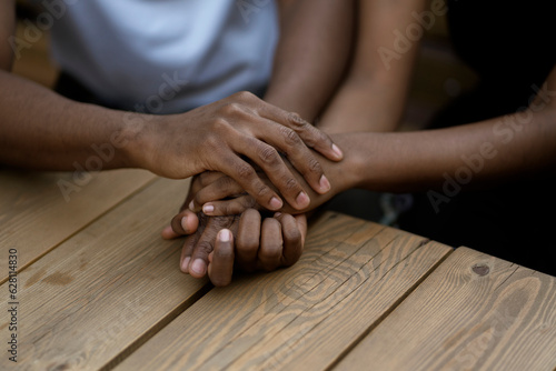 black couple in love hold each other hand  symbol of support trust and empathy