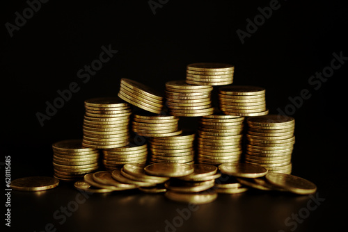 Wallpaper Mural Stack of coins on black background, Saving money concept Torontodigital.ca