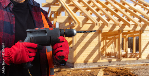 Electric drill in hands bui...