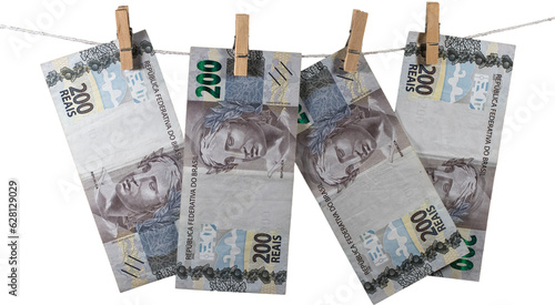 200 reais banknotes from Brazil on the clothesline on transparent background. photo