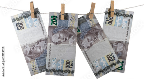 200 reais banknotes from Brazil on the clothesline on transparent background.