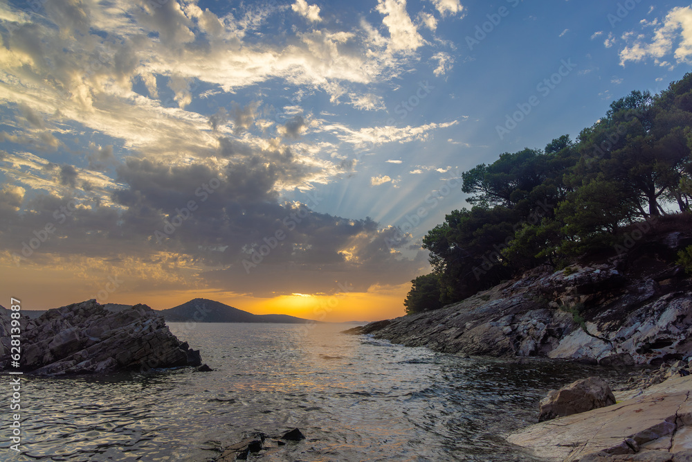Sunset with the clouds on the Adriatic coast of Croatia