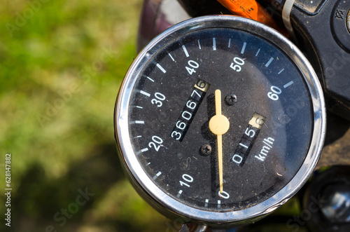 black dial shows the speed of the motorcycle.