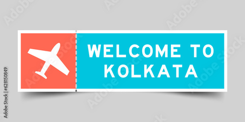 Orange and blue color ticket with plane icon and word welcome to kolkata on gray background