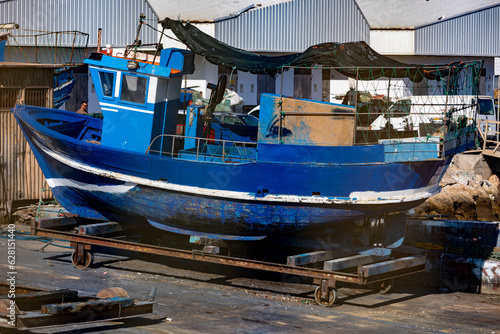 Blue fishing boat in the docks