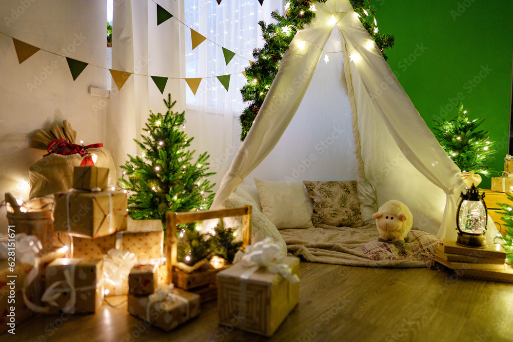 Christmas interior of a children's room with teepee