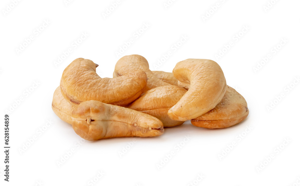 Roasted brown cashew nuts in stack isolated on white background with clipping path. Roasted brown cashew nuts in stack isolated on white background with clipping path.