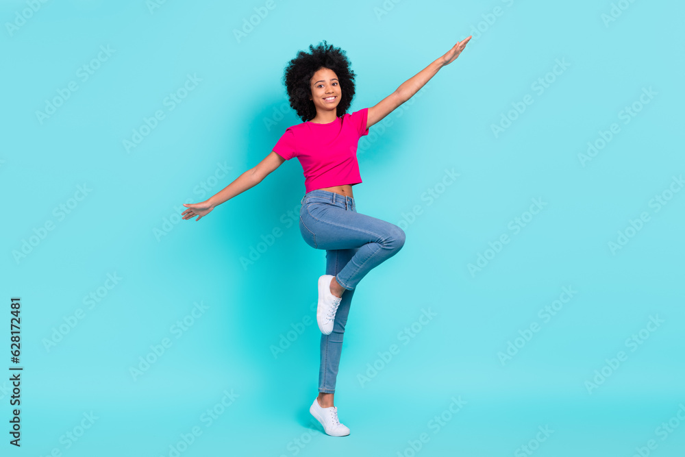 Full size photo of positive overjoyed girl have good mood rejoice dancing isolated on bright teal color background