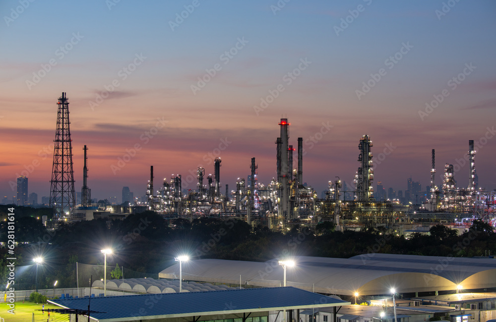 Industry Oil refinery oil and gas refinery background, Business petrochemical industrial, Refinery oil and gas factory power and fuel energy, Ecosystem estates. Fuel refinery industry at evening light