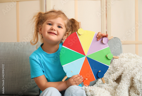 Cute little girl with match...