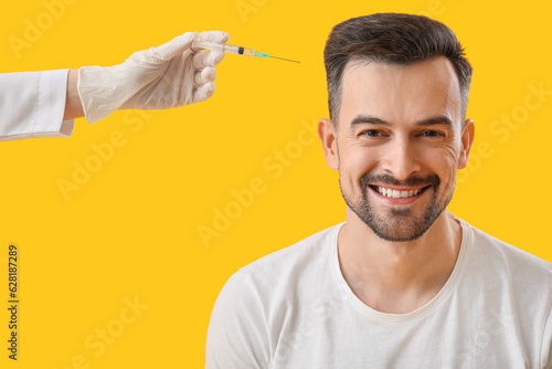 Handsome man and doctor wit...