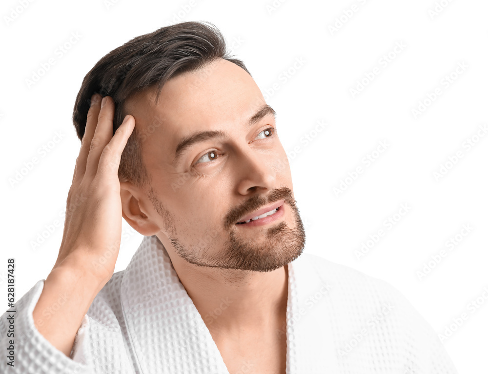 Handsome man with hair loss problem on white background, closeup Handsome man with hair loss problem on white background, closeup