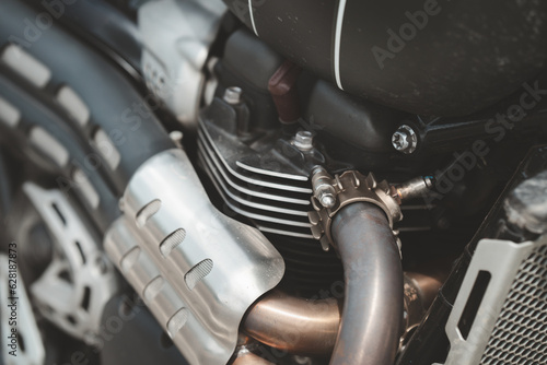 Rear view of the motorcycle. Exhaust part of a motorcycle Classic bikes on the road