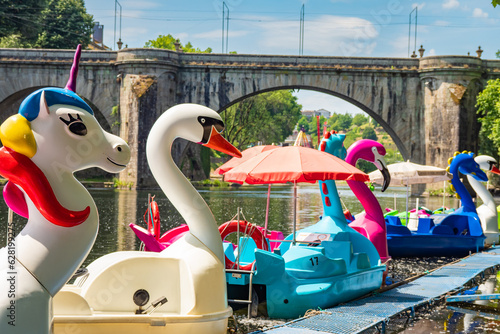 Peddle boats on lake during summer heatwave in Portugal during record setting heat 