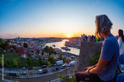 Porto, Portugal - Enjoying the stunning sunset above the Douro river in Porto during summer photo