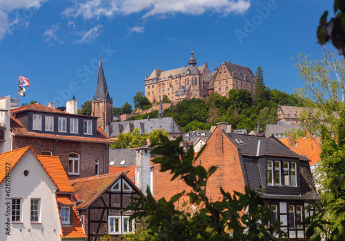 View of the castle on the mountain in the city of Marburg on a sunny summer morning.