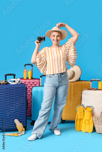 Mature woman with photo cam...