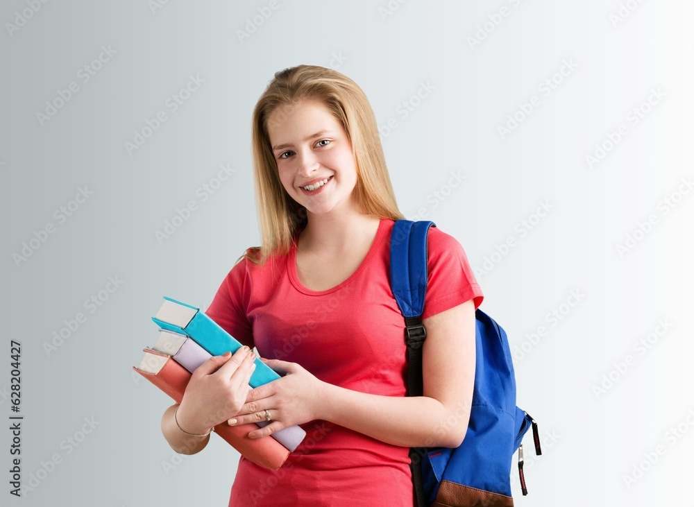 Young student girl posing with backpack Young student girl posing with backpack