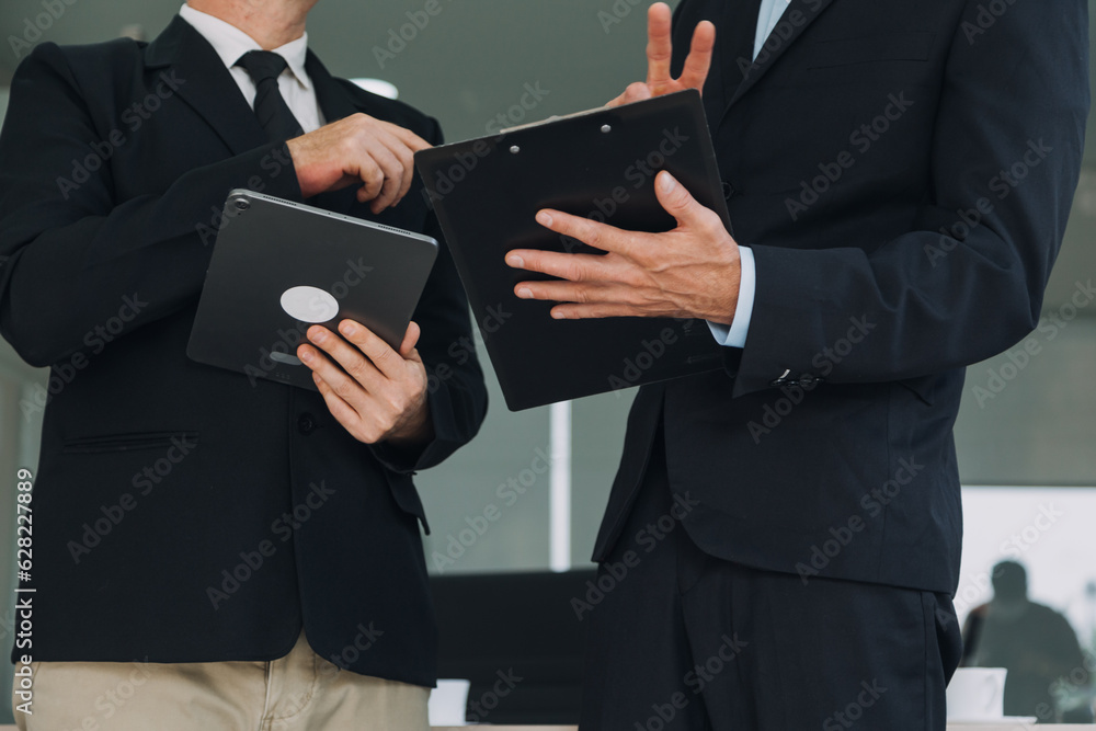 Teamwork with business people analysis cost graph on desk at meeting room. Teamwork with business people analysis cost graph on desk at meeting room.