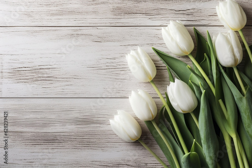 Flowers, nature, international women day, mothers day concept. Bouquet of tulip flowers on wooden background with copy space. Top view. Generative AI