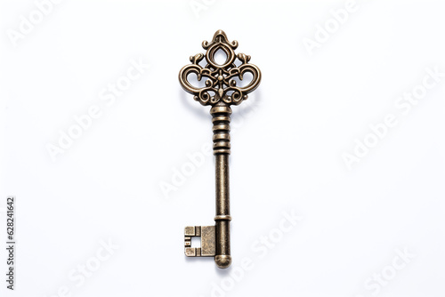 Brass key on a light plain background