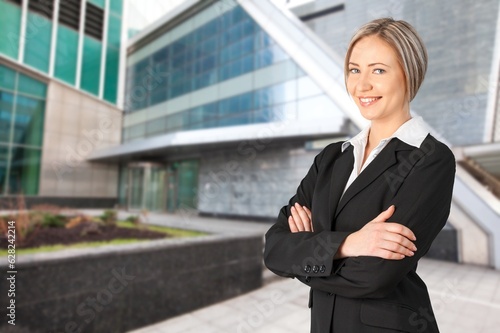 Young confident successful business woman, office employee