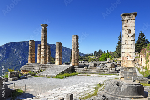 Apollo Temple in Delphi, an archaeological site in Greece, at the Mount Parnassus. Delphi is famous by the oracle at the sanctuary dedicated to Apollo photo
