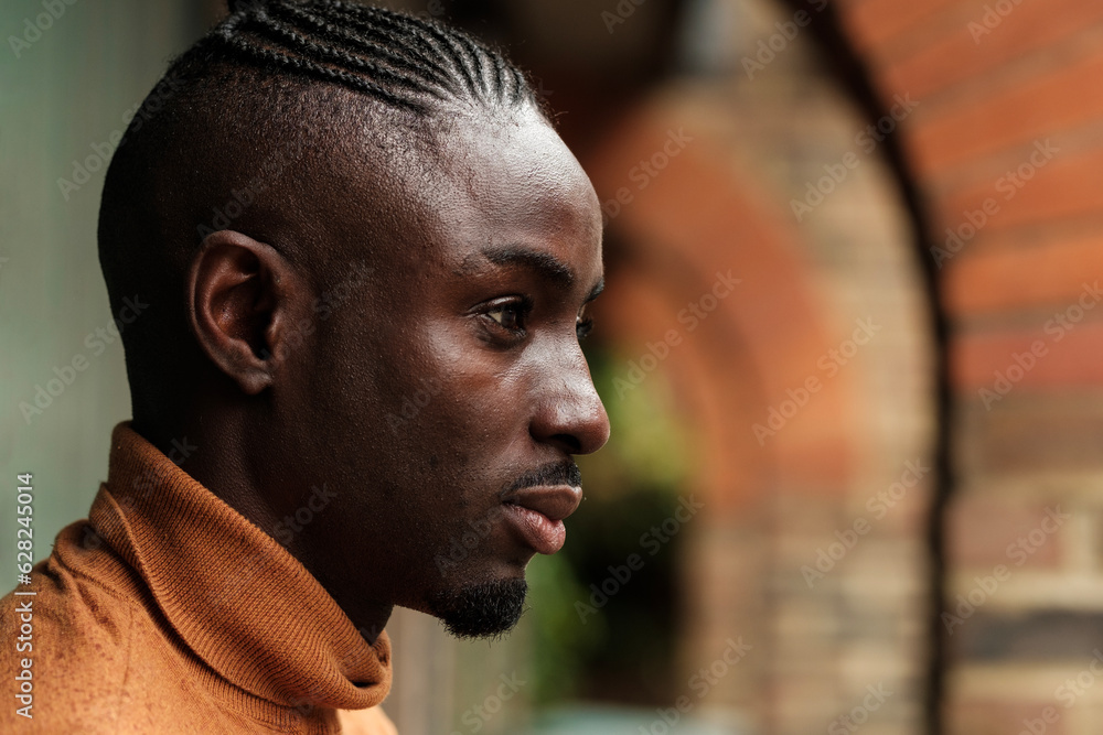 Portrait of black male model outside. Portrait of black male model outside.