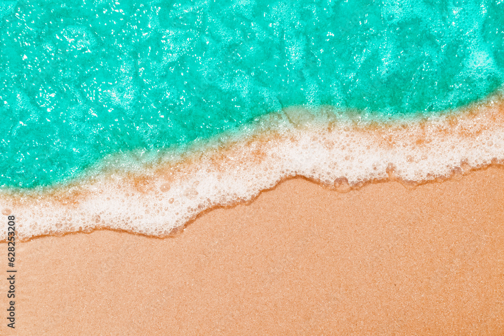 Soft Blue ocean wave on sandy beach. tropical white sand With the sea at the corner. - obrazy, fototapety, plakaty 