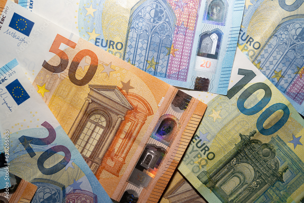 Cash money background with 50 euro, 100 euro and some 20 euros 